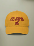 Mustard yellow dad hat embroidered in dark red with 17TH ANNUAL CHILI COOK-OFF, a chili pepper, and 1997.