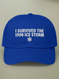 Royal blue dad hat embroidered in white with I SURVIVED THE 1998 ICE STORM above a snowflake.