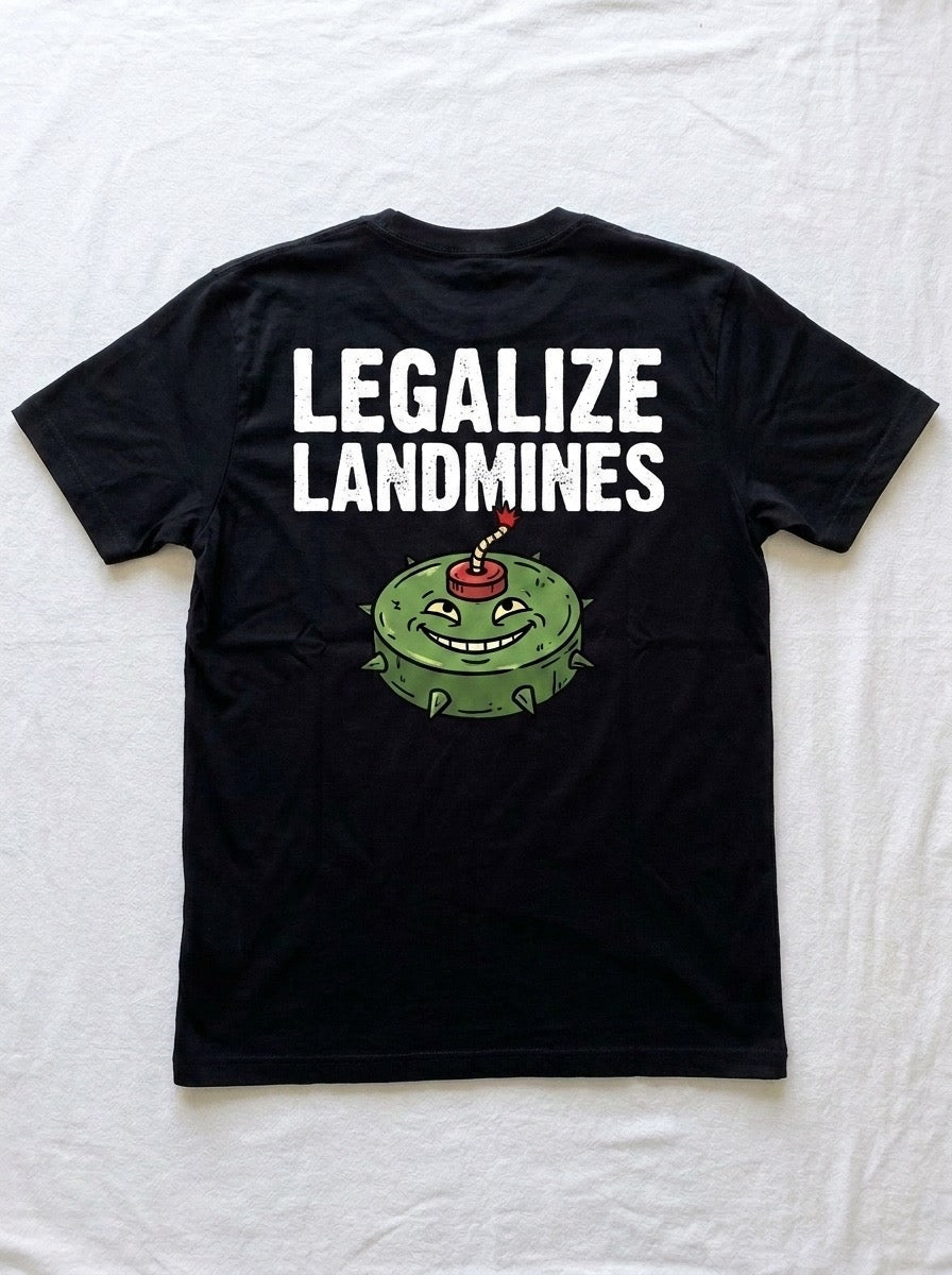 Back of a black t-shirt printed with LEGALIZE LANDMINES above a smiling green cartoon mine.
