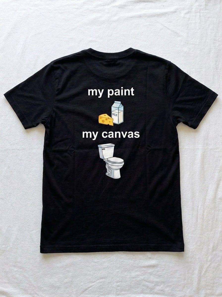Back of a black t-shirt printed with my paint above milk and cheese, and my canvas above a toilet.