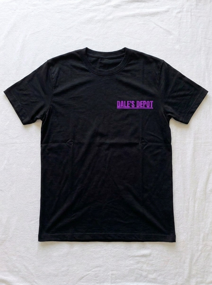 Front of a black t-shirt, blank apart from a small DALE'S DEPOT logo in purple on the left chest.