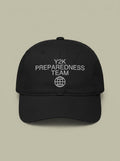 Black dad hat embroidered in silver-grey with Y2K PREPAREDNESS TEAM above a globe.